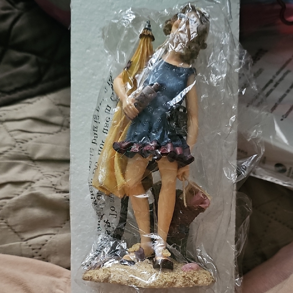 Charming Blue and Yellow Figurine